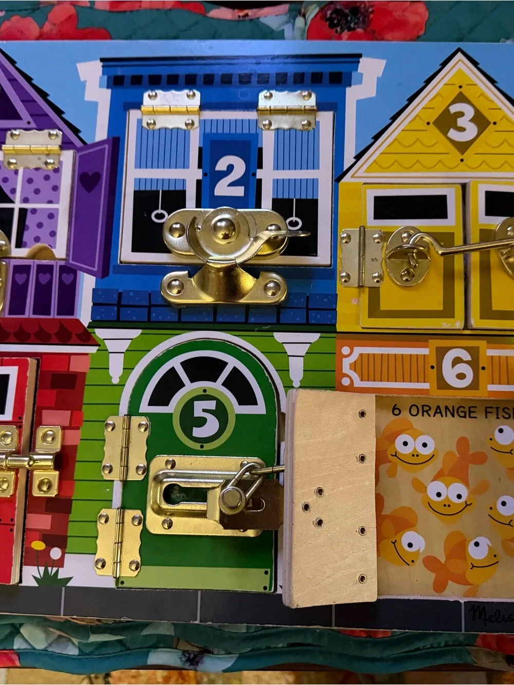 Melissa & Doug latches Kids Busy Board with Locks and Latches!